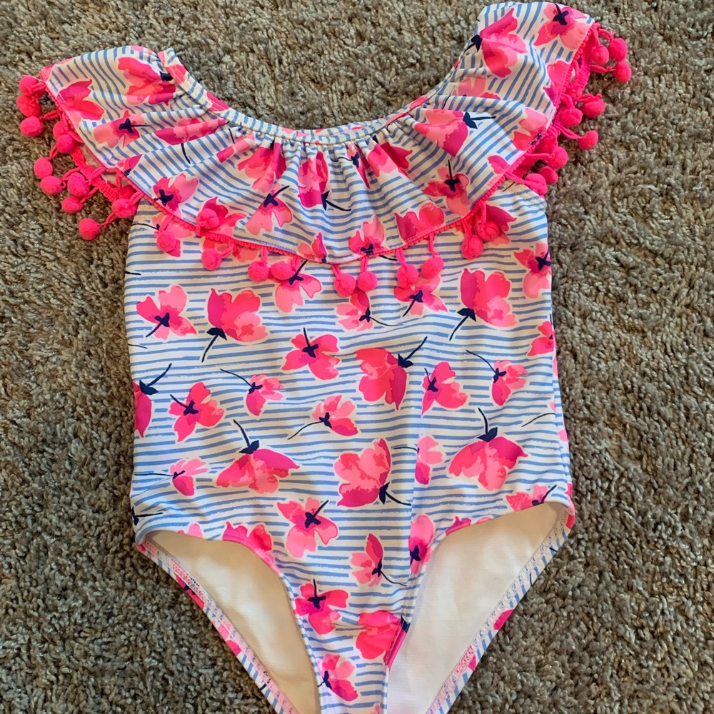 Nicole miller size 4 off the shoulder swim suit with pom poms